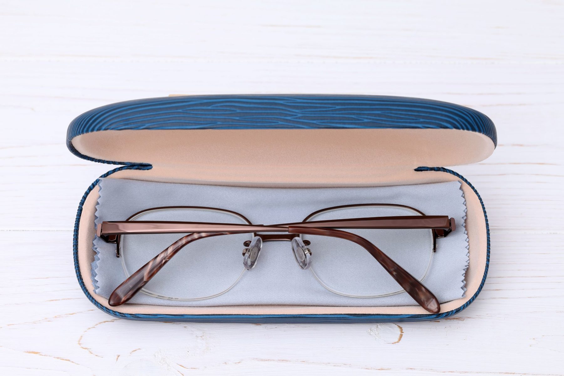 packing eyeglasses in a case for travel