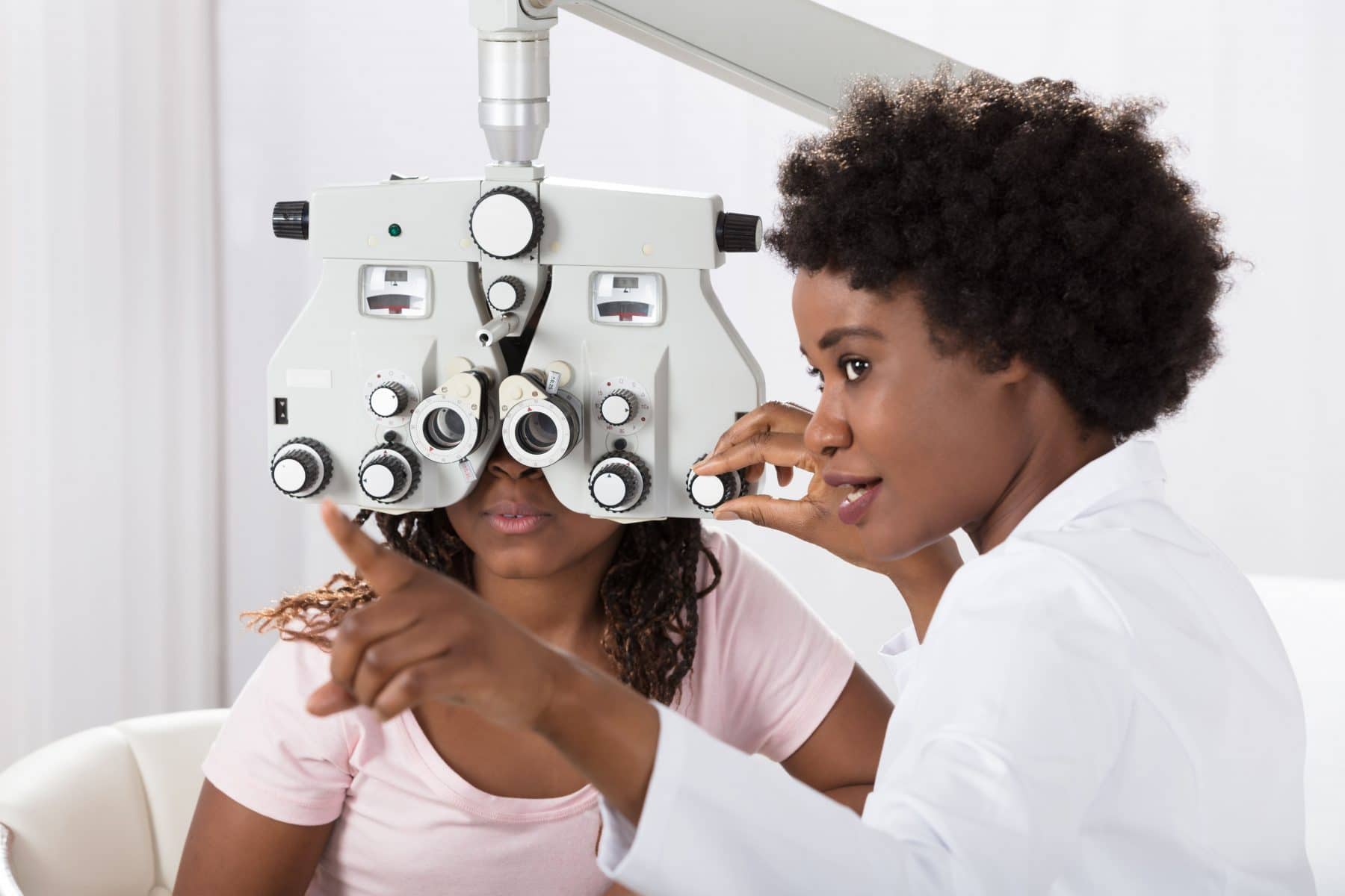 lasik eye surgeon with patient