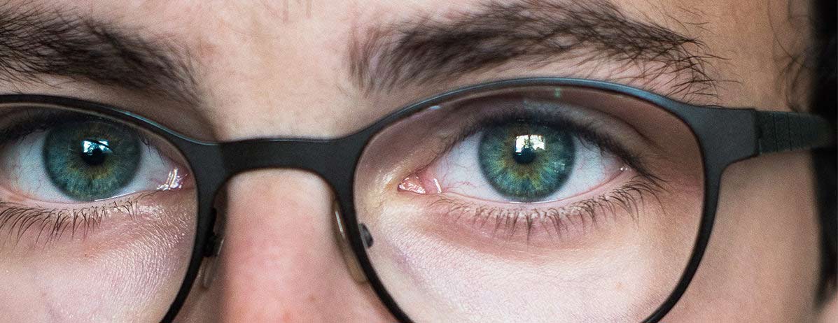 Blue Green eyes wearing eye glasses